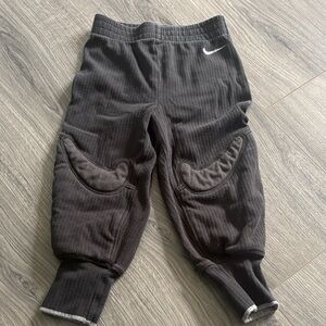 Nike Kids Black Padded Soccer Pants with White Swoosh